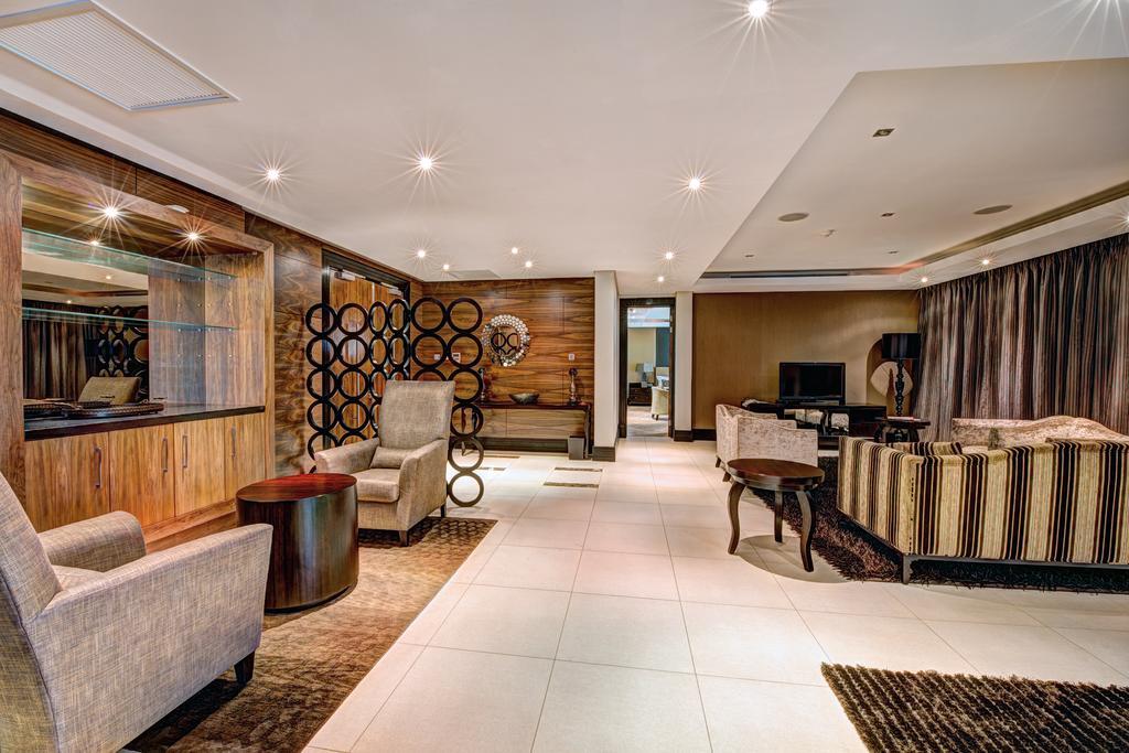 Royal Marang Hotel Phokeng Zimmer foto The interior of the hotel